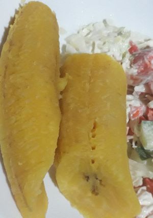 A picture of Boiled plantain and coleslaw.