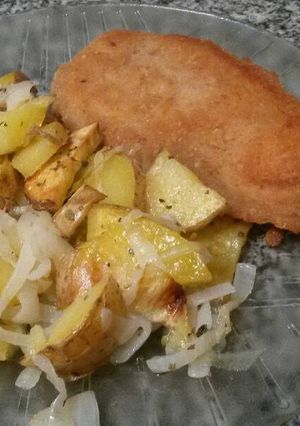 Una foto de Papas al horno encebolladas