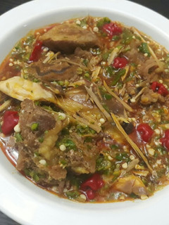 A picture of Okro soup with ugba.