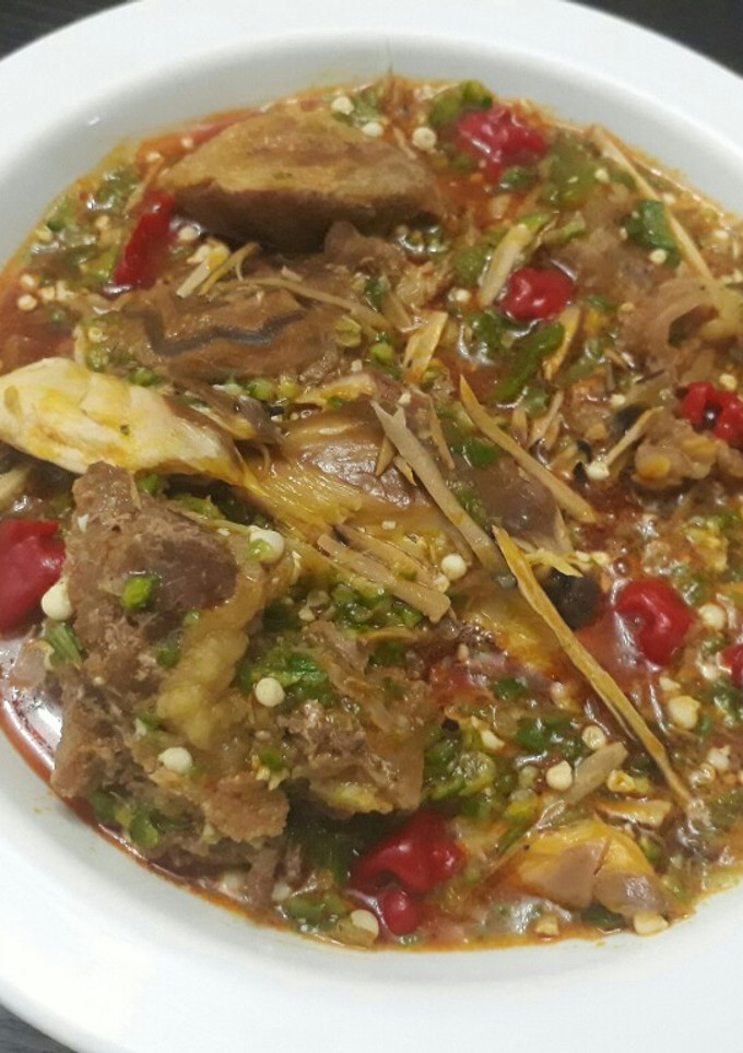 A picture of Okro soup with ugba.