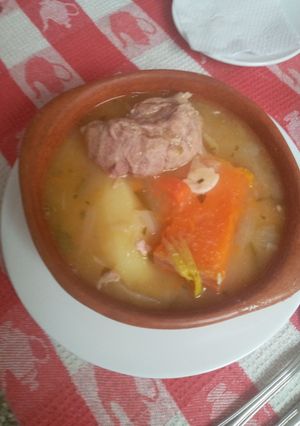 Una foto de Cazuela de Chancho con Chuchoca