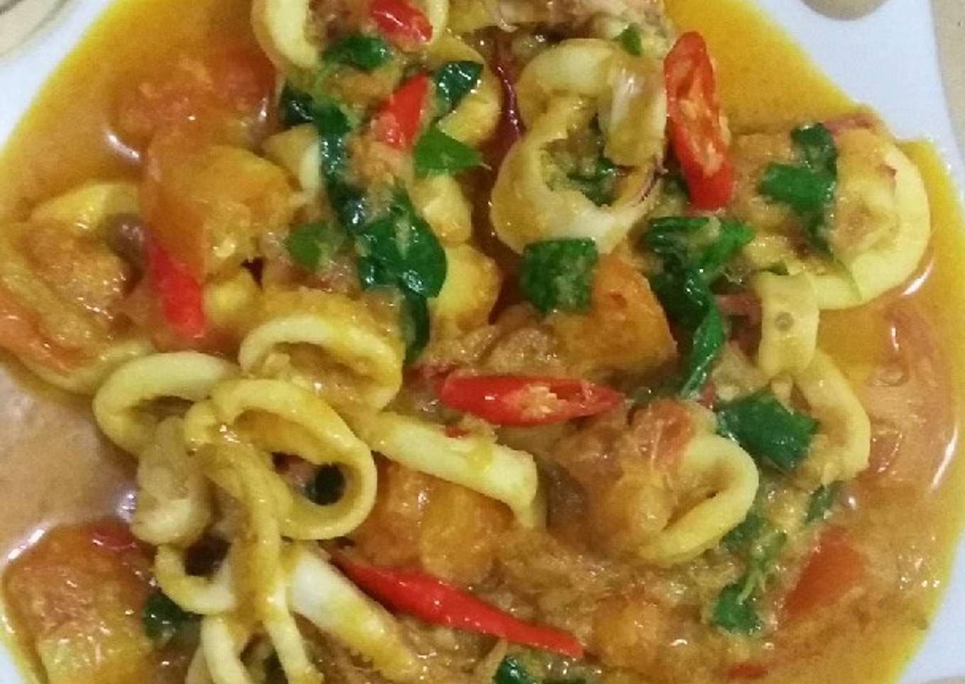 Cumi woku