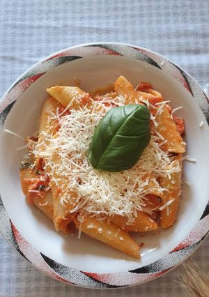 A picture of Penne with Tomatoes and Feta.