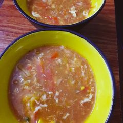 A picture of Tomato Egg Drop Soup.