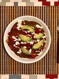 Chilaquiles de pasilla mole con chorizo