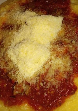 Una foto de Polenta con tuco o salsa