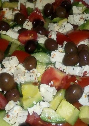 A picture of Cucumbers, Avocado and Tomato salad.