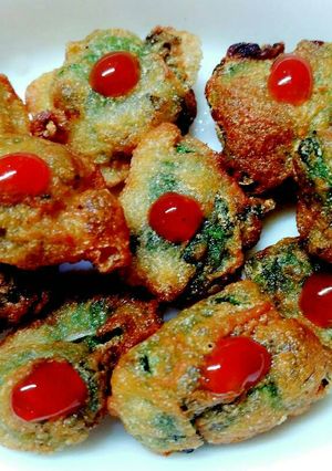 A picture of Cheesy palak fritters.