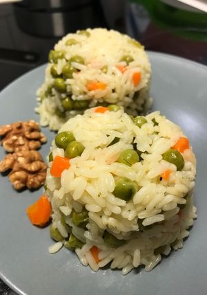 صورة لوصفة رز بالجزر والبازيلاء😻😻