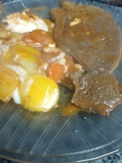 Una foto de Bifes a la criolla