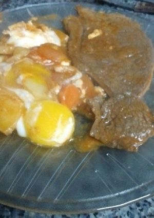 Una foto de Bifes a la criolla