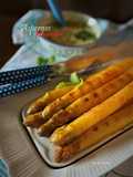 Asperges marinées à la harissa, sauce yaourt et herbes fraîches
