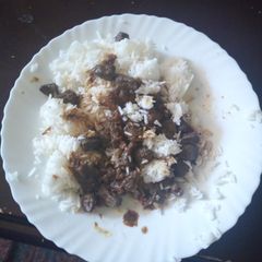 A picture of Fried liver with rice.
