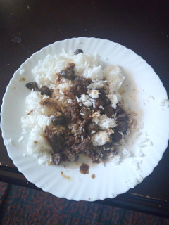 A picture of Fried liver with rice.