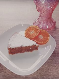 Una foto de Bizcocho 🥧 de papaya, naranja 🍊 y caqui
