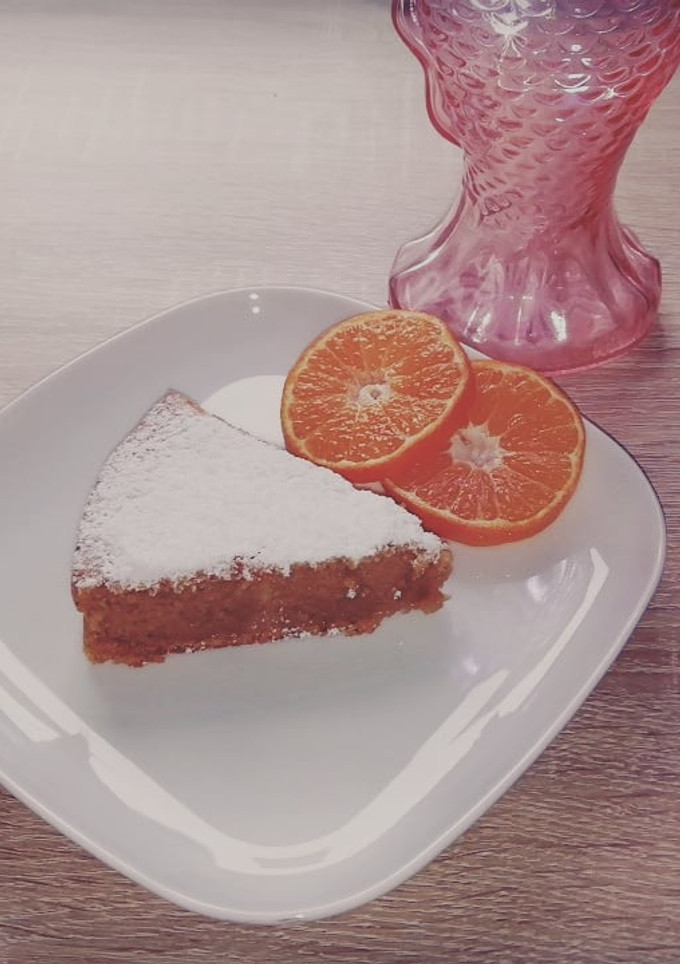 Una foto de Bizcocho 🥧 de papaya, naranja 🍊 y caqui