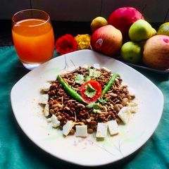 A picture of Mixed Lentils Sprouts and fresh homemade Orange juice.