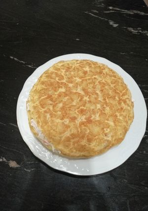 Foto principal de Tortilla de patata, rellena de bocas de mar
