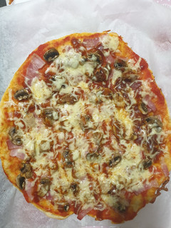 Una foto de Pizza casera con especias BBQ