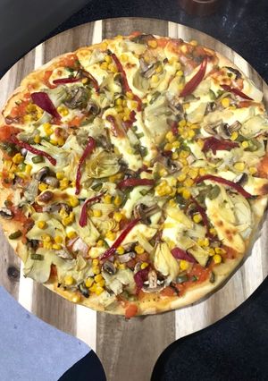 Una foto de Pizza casera de vegetales