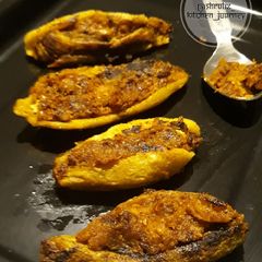 A picture of STUFFED BITTER GOURDS or BHARWAN KARELE.