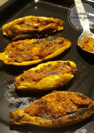 A picture of STUFFED BITTER GOURDS or BHARWAN KARELE.