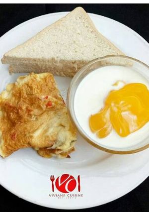 A picture of Custard, fried Egg & Bread.