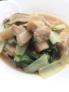 A picture of Bak Choy With Pork Belly In Dang Gui Sauces.