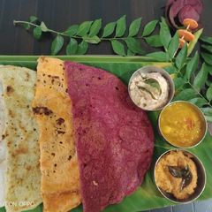 A picture of Rainbow peas beetroot carrot and plain of dosa.