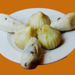 A picture of Sweet and savory Dumplings (Kozhukattai inTamil).