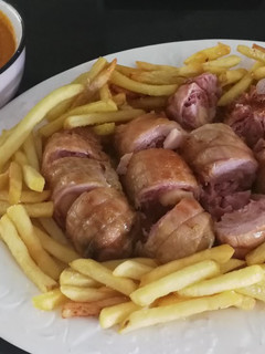 Una foto de Muslitos de pollo rellenos