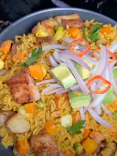 Una foto de Arroz con chancho