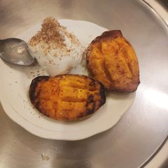 Grilled Mango with Vanilla Icrecream A picture of Grilled Mango with Vanilla Icrecream.