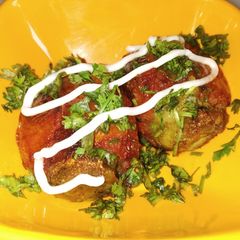 A picture of Stuffed Red tomato.