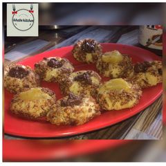 Thimble cookies with Nutella and lemon curd filling recipe by khabs kitchen A picture of Thimble cookies with Nutella and lemon curd filling recipe by khabs kitchen.