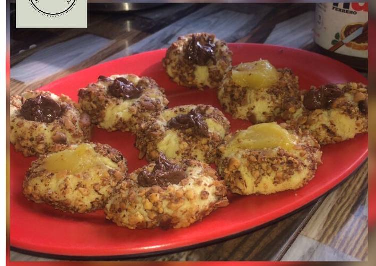 Thimble cookies with Nutella and lemon curd filling recipe by khabs kitchen Thimble cookies with Nutella and lemon curd filling recipe by khabs kitchen
