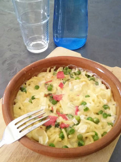 Una foto de Fideua carbonara