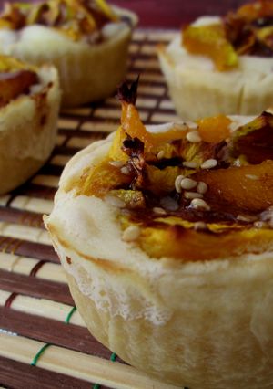 A picture of Roast pumpkin & cheese cups with chocolate-honey topping..
