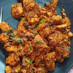 A picture of Mustard chicken (chicken besara).