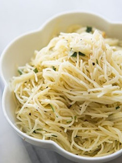 A picture of Angel Hair Pasta with Garlic Herbs and Parmesan.