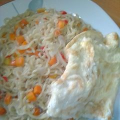 A picture of Veggy indomie with fried egg.
