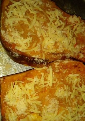 Una foto de Zapallo al horno, relleno y gratinado