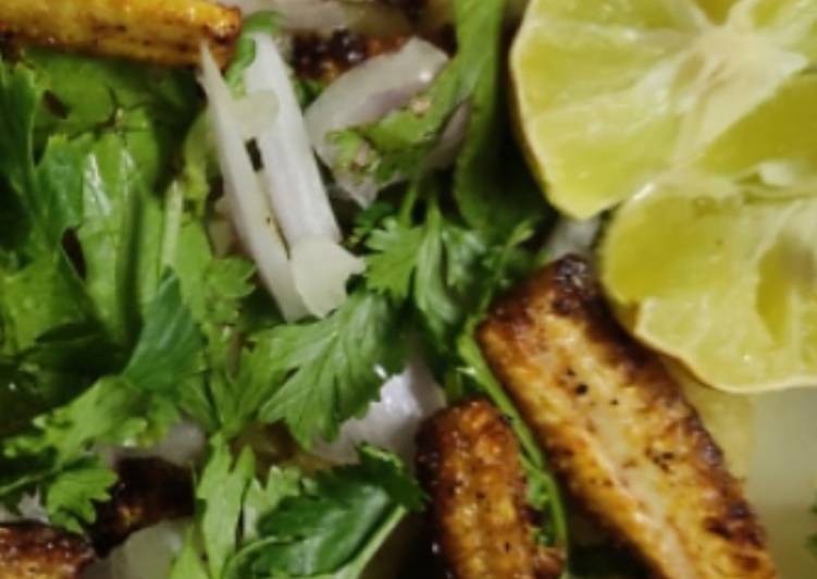 Spiced fried aloo with sizziled baby corn