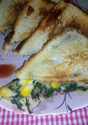 A picture of Spinach corn sandwich.