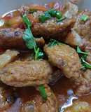 Chả cá, thịt và tóp mỡ sốt cà