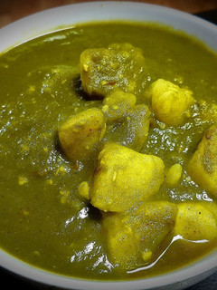 A picture of Aloo Palak (Potato in Spinach Puree).
