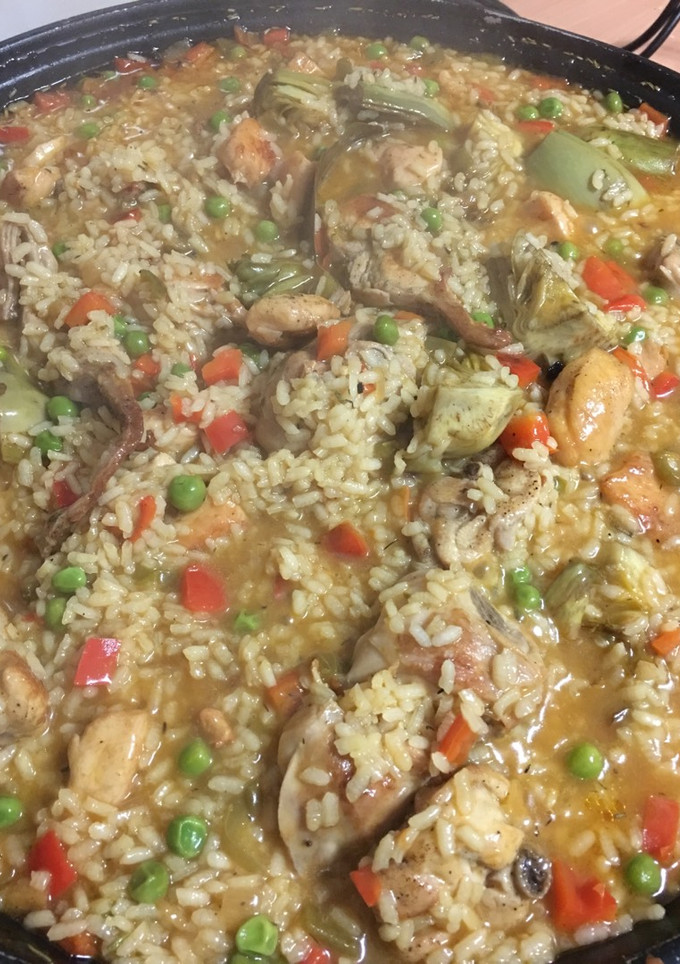 Una foto de Arroz con pollo y conejo