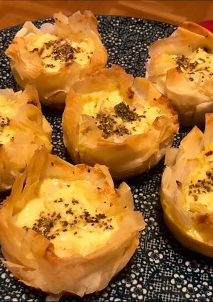 Una foto de Cestas estilo quiche rellenas de bacon, cebolla, queso y trigueros