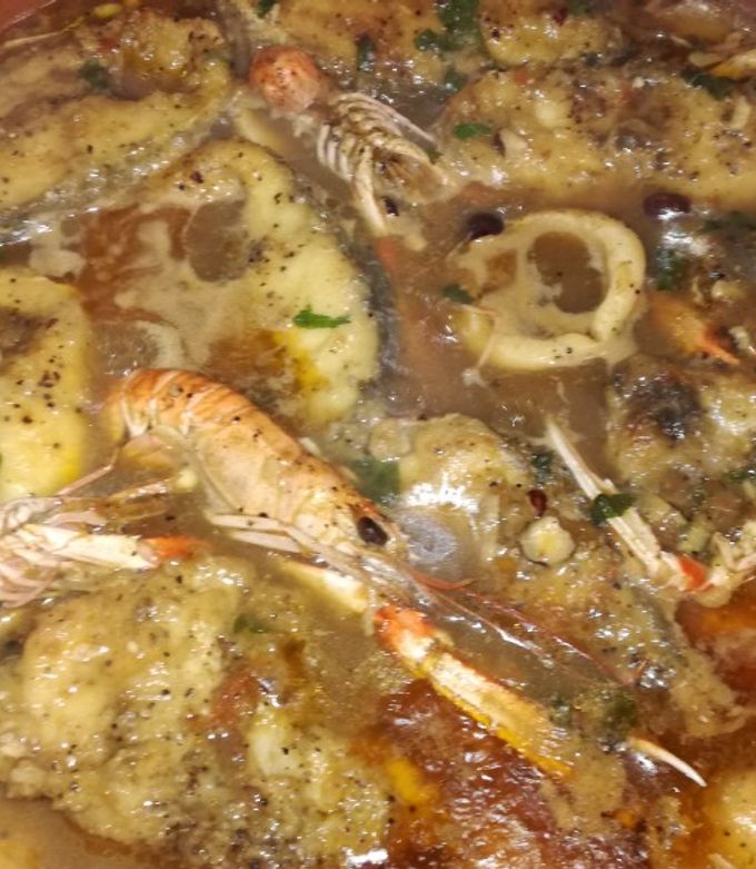 Foto principal de Suquet de corvina con cigalas y calamares