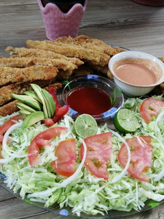Una foto de Fajitas de filete de pescado empanizado